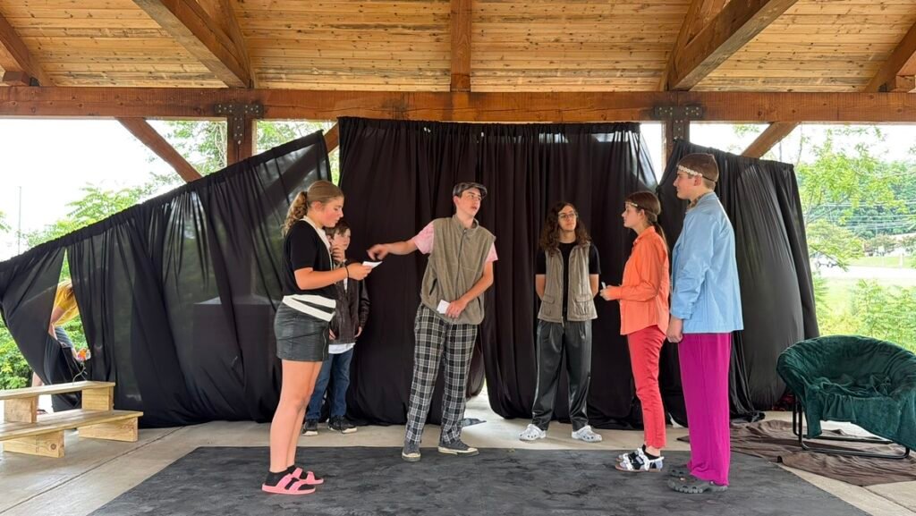 Campers rehearsing on stage at Puck’s Midsummer Mischief camp